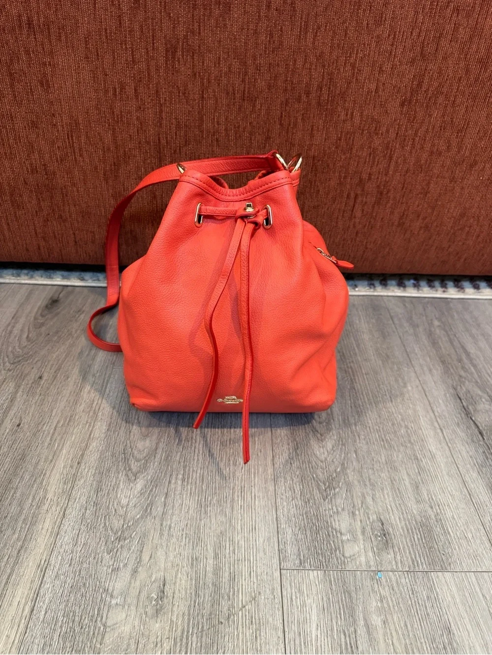 Coach Twist Lock Coral-Orange Pebbled Leather Drawstring Shoulder Bag